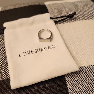 DON'T  MISS A DEAL..Love Aero 18kGold Plated Silver Toned Unisex Ring